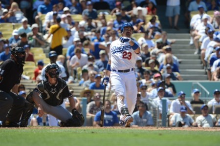 Adrian Gonzales gives the Los Angeles Dodgers a boost with a three-run home run against the Miami  Marlins Sunday, August 26, 2012 at Dodger Stadium in Los Angeles. Photo by Jon SooHoo/Â©Los Angeles Dodgers,LLC 2012