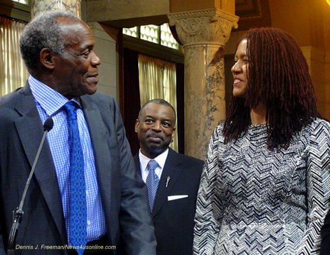 Actor Danny Glover shares a moment with his wife while Levar Burton looks on. Photo Credit: Dennis J. Freeman