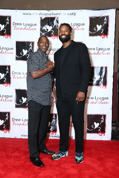 Drew League Foundation Honorary Board Member and former NBA player Baron Davis (right) attends the foundation's awards gala. 
