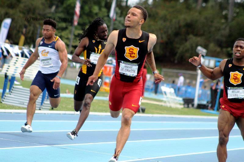 Blazing to victory: USC sprinter Andre De Grasse crosses the finish line in the 100 meters in record time at the 2015 Pac-12 Conference Track and Field Championships on Sunday, May 17, 2015. Photo by Dennis J. Freeman