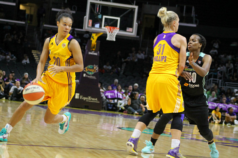 Sparks guard Kristi Toliver on the move against the New York Liberty. Photo by Dennis J. Freeman