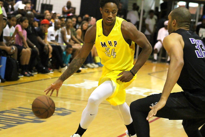 Compton native DeMar DeRozan (Toronto Raptors) tries to get to the basket for  the Most Hated Players in the championship game at the Drew League. Photo by Dennis J. Freeman 