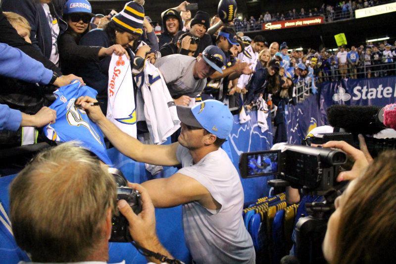 Quarterback Philip Rivers signs autographs after the San Diego Chargers final home game of the 2015 season. Photo by Dennis J. Freeman/News4usonline.com