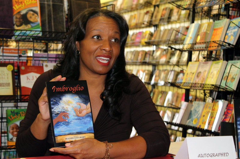 "Imbroglio" author Heather Dawn Robin holds court with a book signing in Inglewood, California. Photo by Dennis J. Freeman/News4usonline.com
