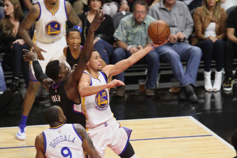 Golden State's Steph Curry goes in for two of his 23 points against the Los Angeles Clippers Saturday, Feb. 20, 2016. Photo by Kevin Reece/News4usonline.com