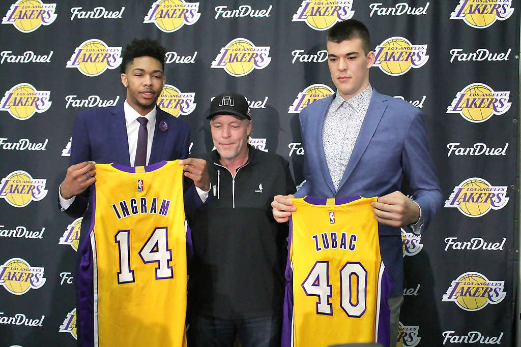 Los Angeles Lakers rookies Brandon Ingram (left) and Ivaca Zubac surround Jim Buss during their introductory press conference at the team's practice facility. Photo by Dennis J. Freeman/News4usonline