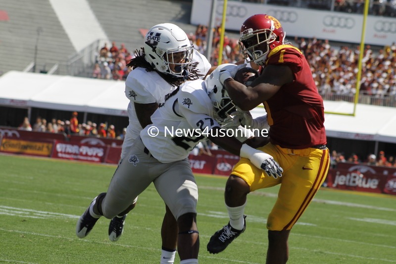 USC wide receiver Darreus Rogers moves the chain with this reception against Utah State. Photo by Dennis J. Freeman/News4usonline