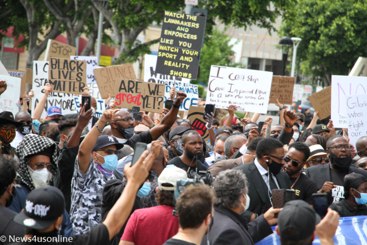 Members of the Baptist Ministers Conference and other demonstrators march down the streets of downtown Los Angeles on June 2, 2020, to protest the killing of George Floyd, who died in police custody. Photo by Dennis J. Freeman