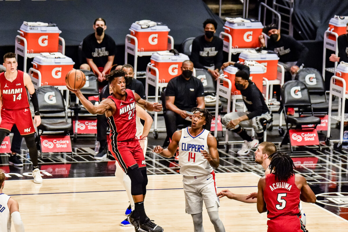 MIami Heat forward Jimmy Butler goes airborne against the Los Angeles Clippers in a game played at STAPLES Center on Monday, Feb. 15, 2021. Photo by Mark Hammond/News4usonline