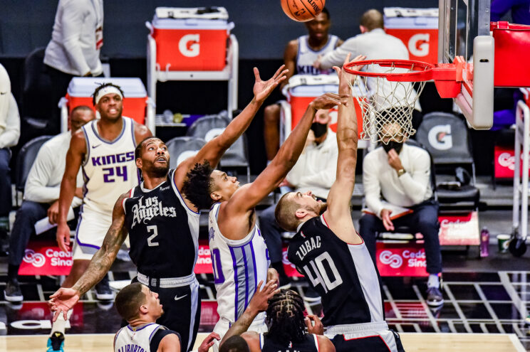 Los Angeles Clippers forward Kawhi Leonard (2) skies for the rebound in a game against the Sacramento Kings. Photo credit: Mark Hammond/News4usonline