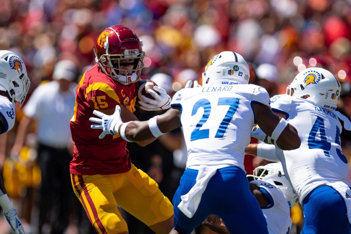 Sept. 4, 2021. USC wide receiver Drake London (15) goes for yards after the catch against a couple of San Jose State defenders. London caught 12 passes for 72 yards in the Trojans' 30-7 win. Photo credit: Sammy Saludo for News4usonline