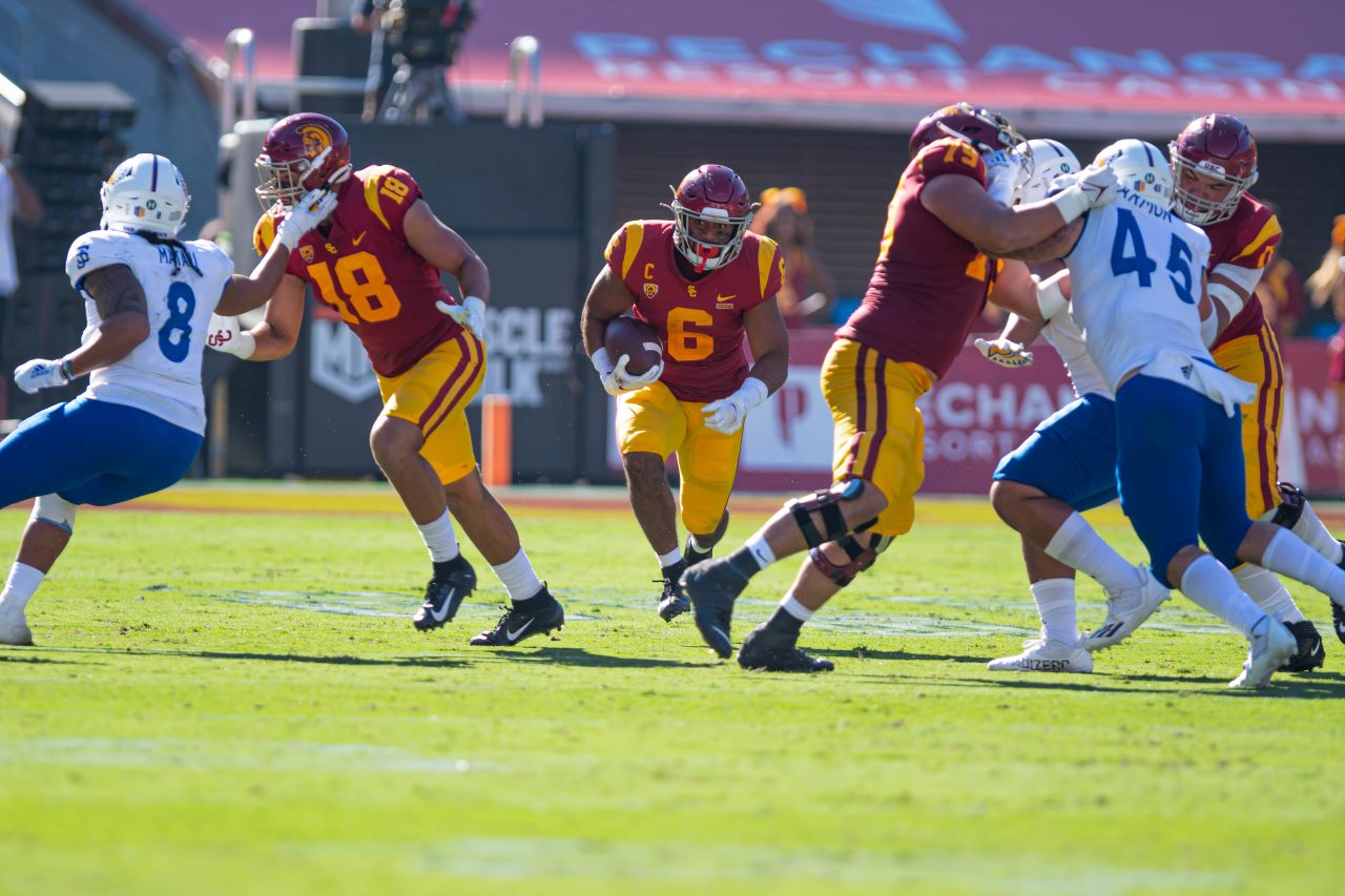 Sept. 4, 2012. Putting the crunch on. USC defenders converge to tackle a San Jose State wide receiver. The Trojans beat the Spartans 30-7 at the Los Angeles Memorial Coliseum. Photo credit: Sammy Saludo/News4usonline