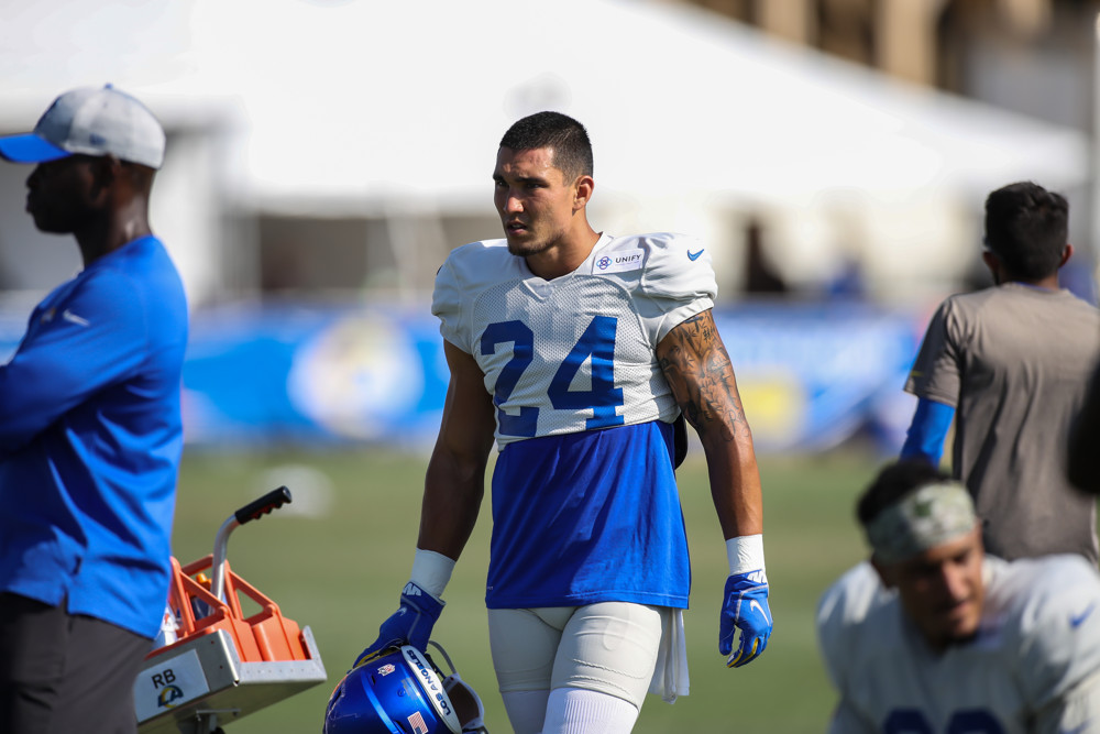 Los Angeles Rams safety Taylor Rapp (24) and Atlanta Falcons place