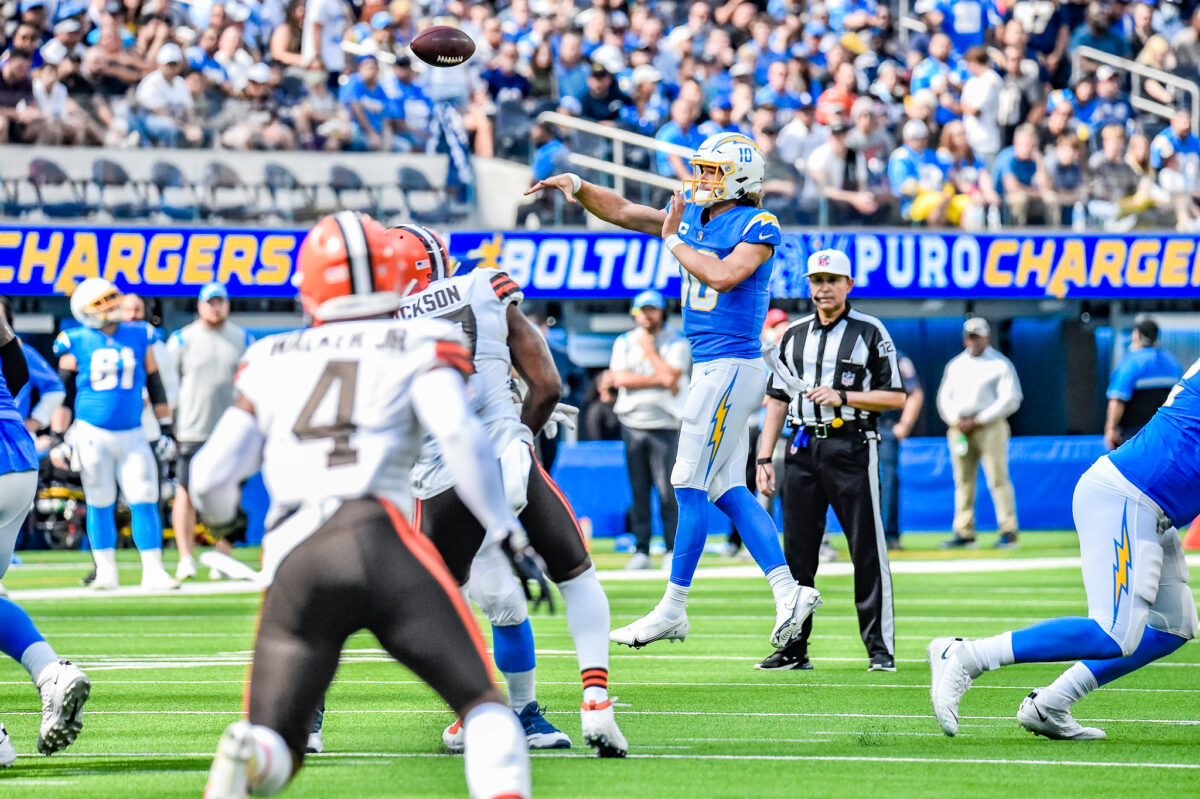 Chargers quarterback Justin Herbert goes back to pass against the Cleveland Browns