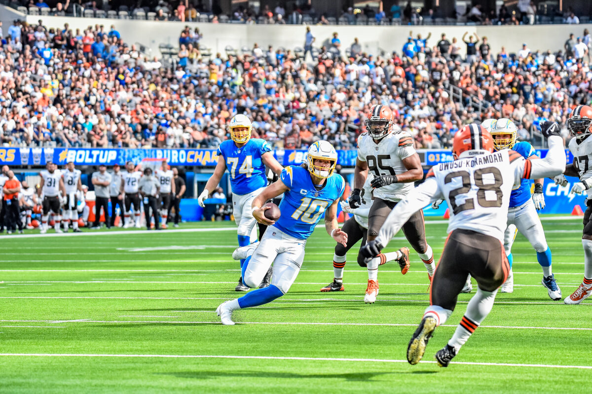 Chargers quarterback Justin Herbert runs for a 9-yard touchdown against the Cleveland Browns.